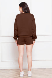 Chocolate crewneck loungewear set with pocket shorts.