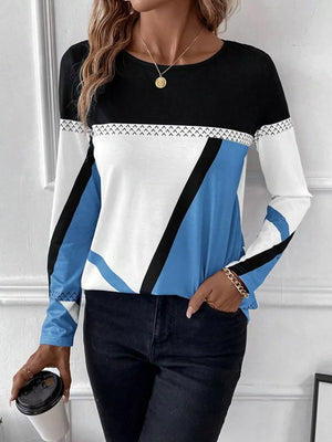 Geometric panel long sleeve t-shirt in black, white, and sky blue with chevron detail.
