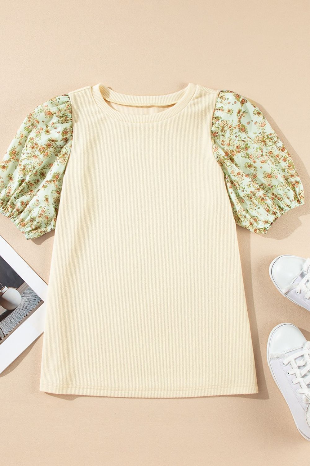 Beige ribbed knit top with floral puff sleeves