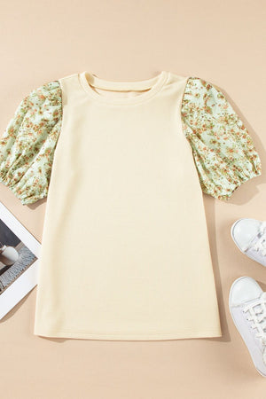 Beige ribbed knit top with floral puff sleeves