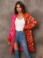 Colorblock leopard knit duster cardigan with button front and pockets.