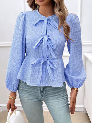 Dusty Blue textured peplum blouse with bow details and puff sleeves