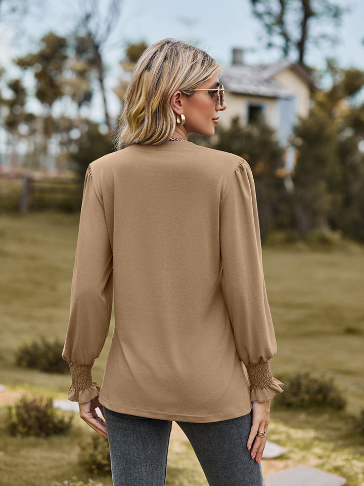 Khaki long sleeve blouse with pleated yoke and shirred cuffs