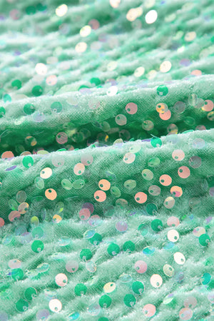 Sequin embellished dolman sleeve top in gum leaf green with iridescent sequins.
