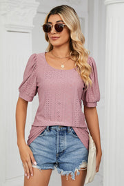 Pink eyelet puff sleeve scoop neck blouse with allover geometric pattern