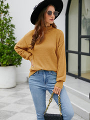 Textured mock neck knit sweater in honey, with long sleeves and a relaxed fit.