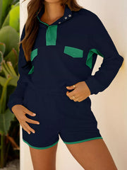 Navy cotton color block two-piece set with green trim and button detail.
