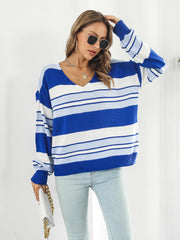 Blue and white striped V-neck acrylic sweater with a relaxed fit.