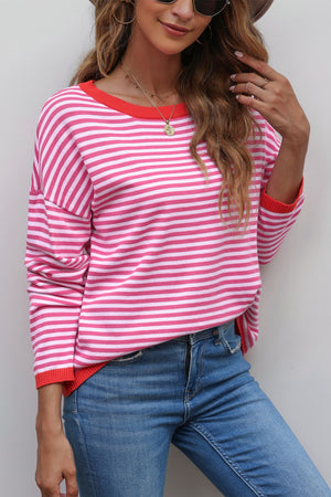Striped crewneck sweater with contrast red trim and crew neckline.