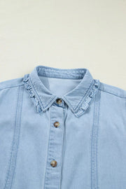 Light blue denim shift dress with ruffled collar and button front detail.