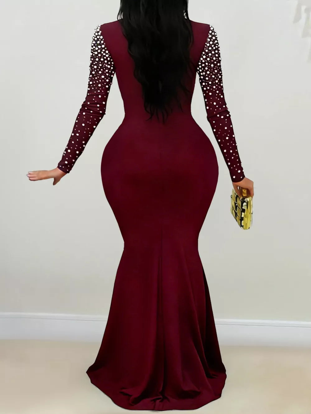 Black fitted formal gown with mock neck