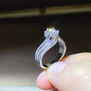 Silver swirl band ring with moissanite and pave diamonds