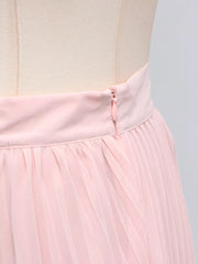 Pink pleated skirt with zipper detail, part of a two-piece ensemble.