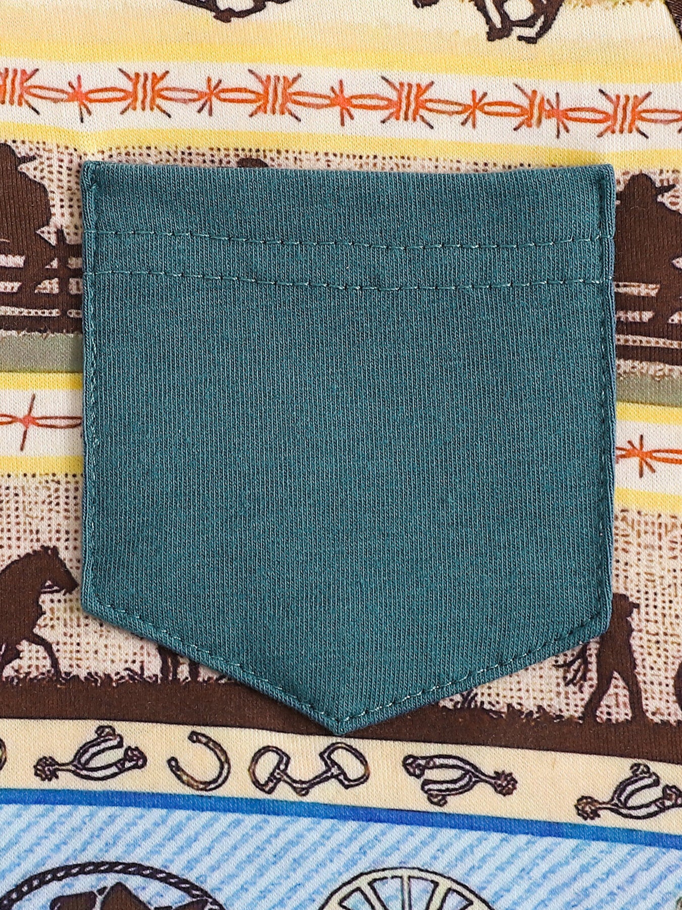Children's cotton tee with western print and teal pocket detail.