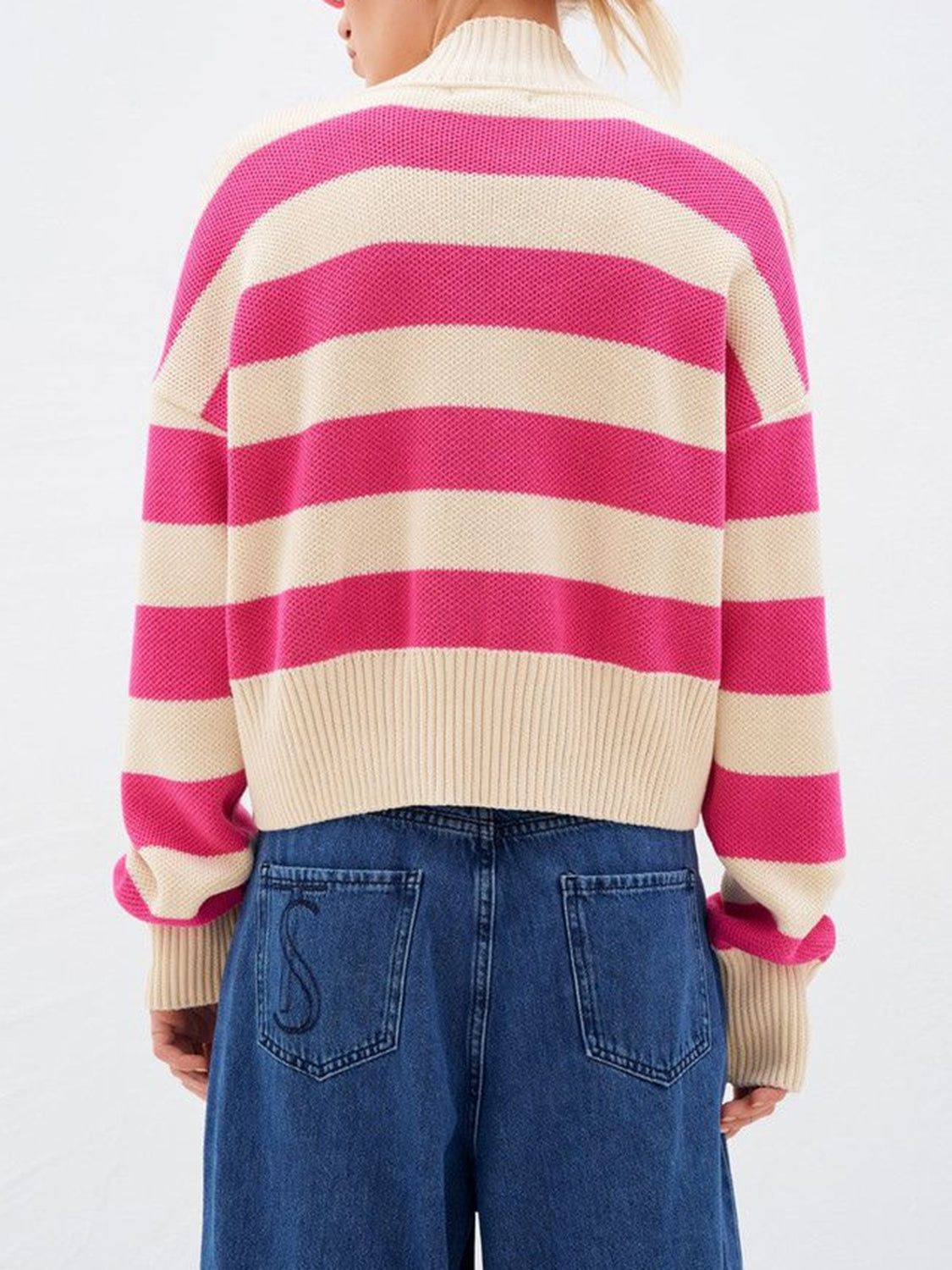 Cropped stripe knit cardigan in pink and cream acrylic with a high neck and ribbed cuffs.