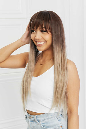 Ombre fringe synthetic hair extension in black to gray, styled with bangs and long straight hair.