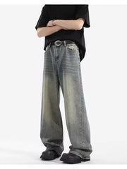 Men's vintage wash relaxed fit jeans with a baggy cut and distressed details.