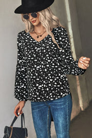 Black dalmatian print blouse with V-neck and balloon sleeves