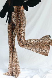 Leopard print bell bottom trousers with a high waist and flared leg.