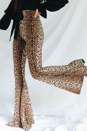 Leopard print bell bottom trousers with a high waist and flared leg.