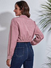 Dusty pink corduroy cropped utility jacket with elasticated hem and buttoned cuffs.