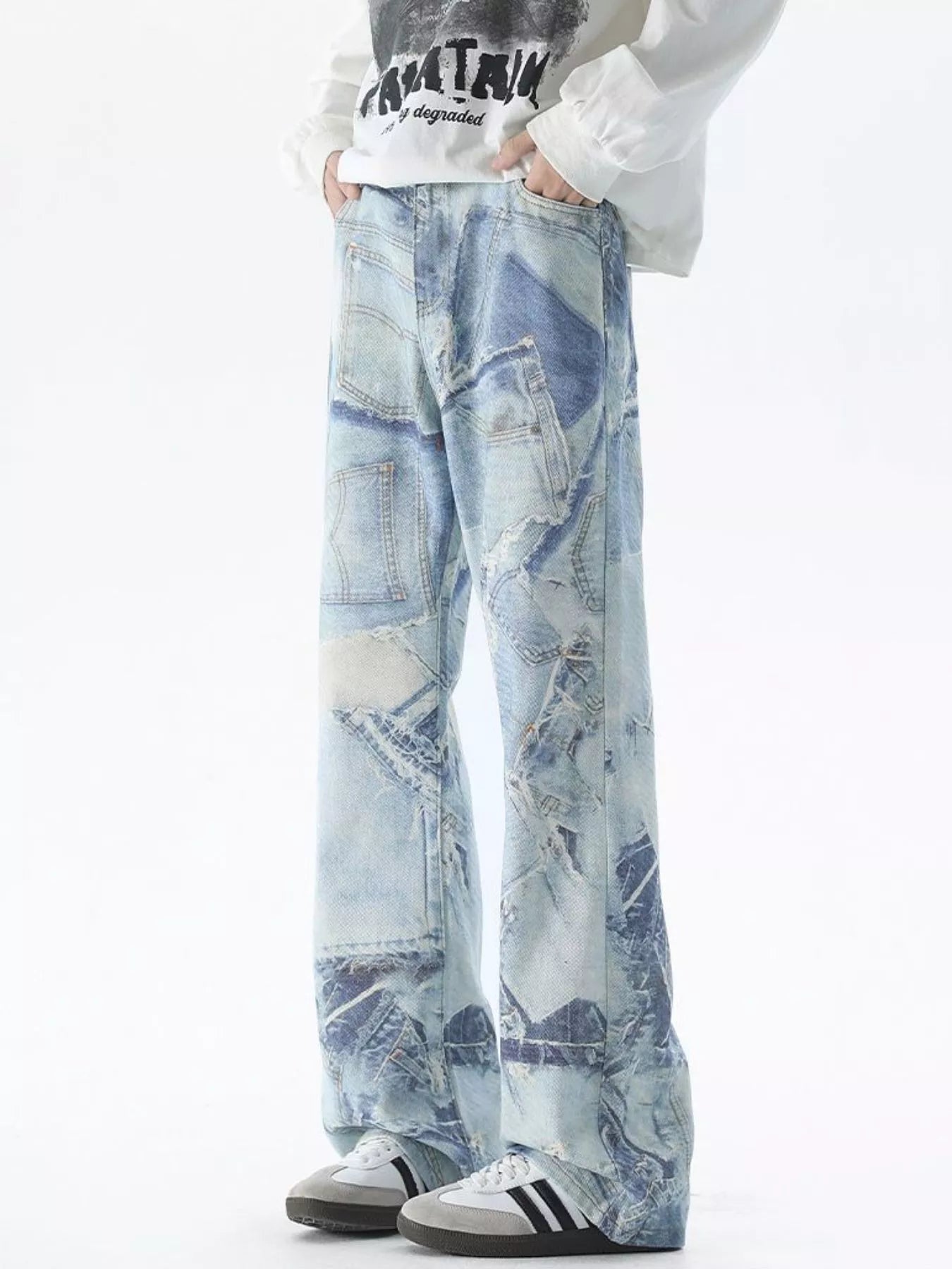 Light blue distressed wide-leg jeans with patchwork denim details.