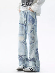 Light blue distressed wide-leg jeans with patchwork denim details.