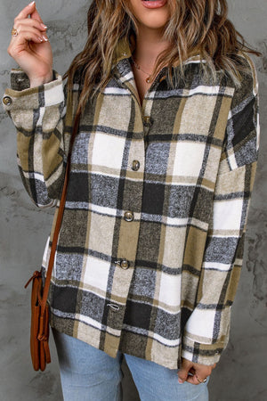 Plaid hooded shacket with button front and relaxed fit.