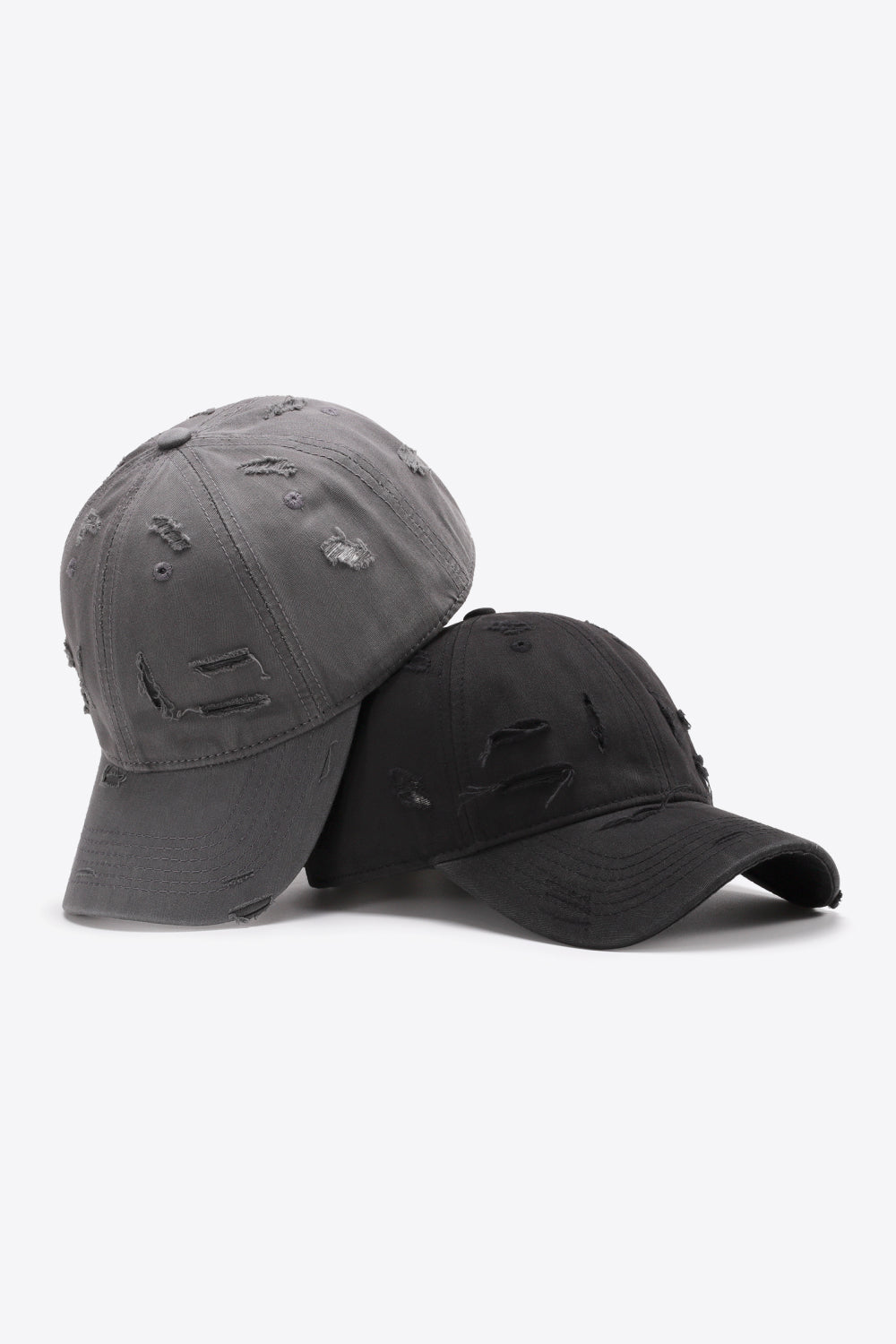 Distressed baseball caps in mid gray and black with adjustable strap