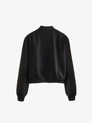 Black boxy bomber jacket with ribbed collar, cuffs, and hem.