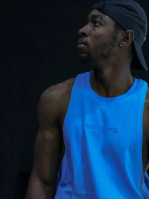 Blue Muscle Armed tank top with embroidered logo detail.