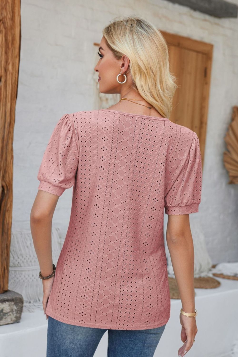 Dusty Pink perforated puff sleeve henley blouse with eyelet detail.