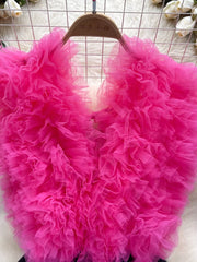 Ruffled V-neck bodysuit in pink with lace detail and voluminous tulle.