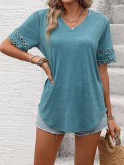 Blue-green V-neck t-shirt with lace trim on sleeves.