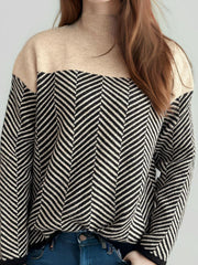 Chevron knit turtleneck sweater with black and tan colorblock and chevron pattern