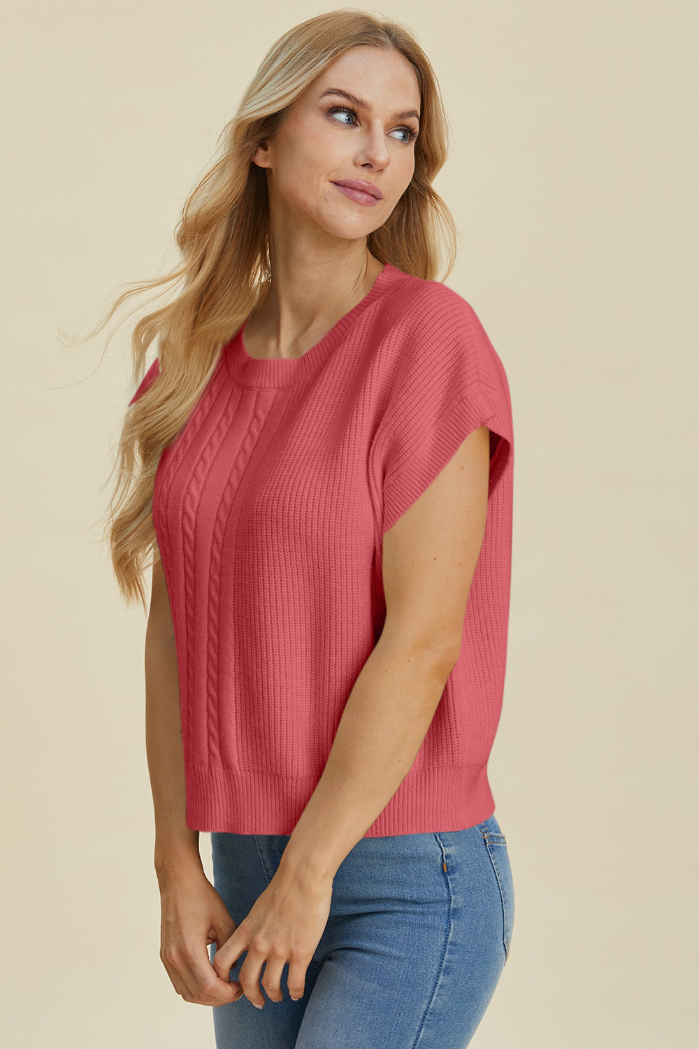 Cable knit cap sleeve pullover in strawberry with crew neck and ribbed details.