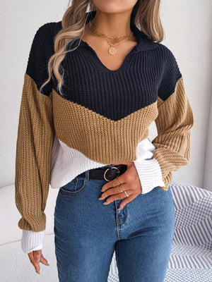 Chevron block knit polo sweater in camel, navy, and white acrylic with a V-neck.