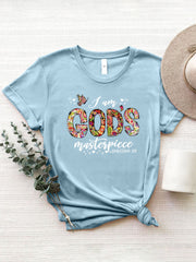 Light Blue graphic t-shirt with "I am God's masterpiece" floral typography and butterfly design.