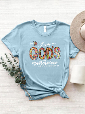 Light Blue graphic t-shirt with "I am God's masterpiece" floral typography and butterfly design.