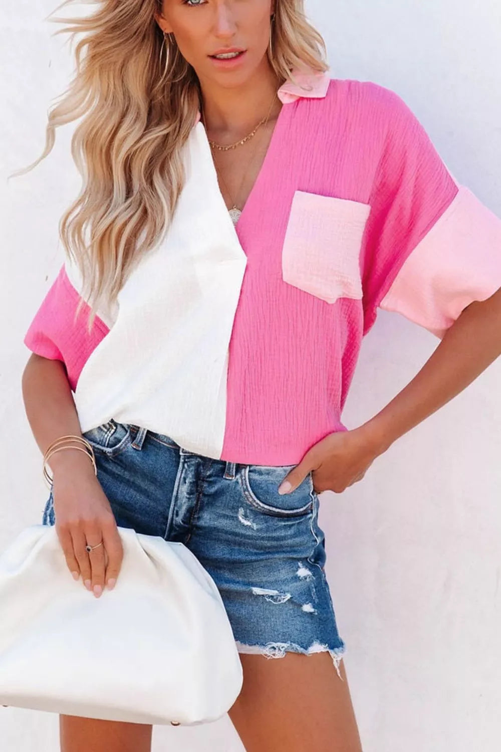 Cotton color block casual shirt with V-neck, short sleeves, and chest pocket.