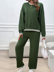 Army green knit lounge set with white ribbed trim on neckline, cuffs, and hem.