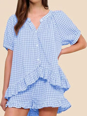 Blue gingham two-piece set with ruffle trim and button-front top.