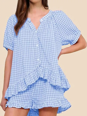 Blue gingham two-piece set with ruffle trim and button-front top.