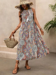 Paisley print midi dress with tie neck and decorative tassels, sleeveless, a-line cut