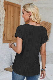 Black perforated eyelet cuffed tee with short sleeves and a v-neck.