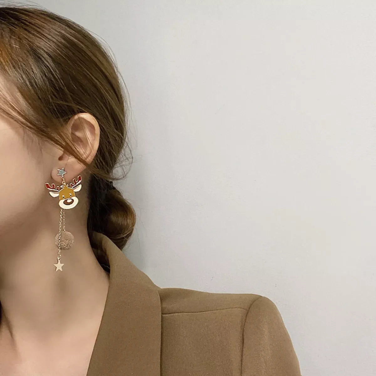 Reindeer drop earrings with pom-pom and star charms, 18K gold-plated.