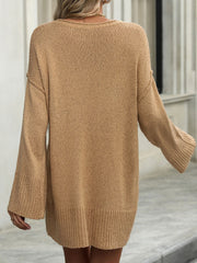 Camel oversized ribbed knit tunic sweater with bell sleeves and crew neck.