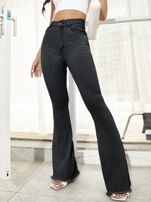 Black bootcut denim trousers with raw hem detail