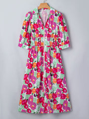 Floral V-neck zip midi dress with smocked waist and puff sleeves.