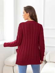 Deep Red cable-knit cardigan with pockets and ribbed trim.